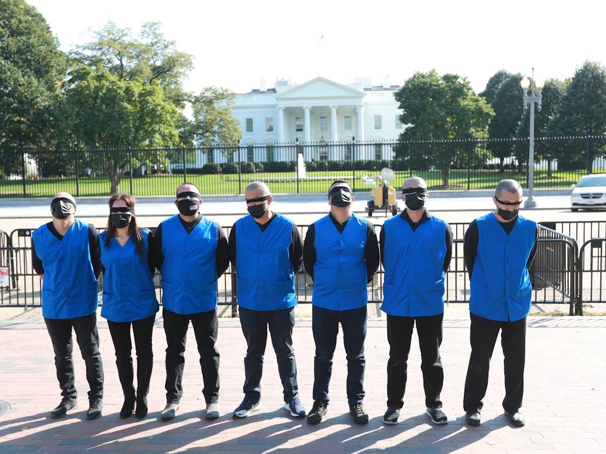 Dry First restoration technicians standing in front of a residential property